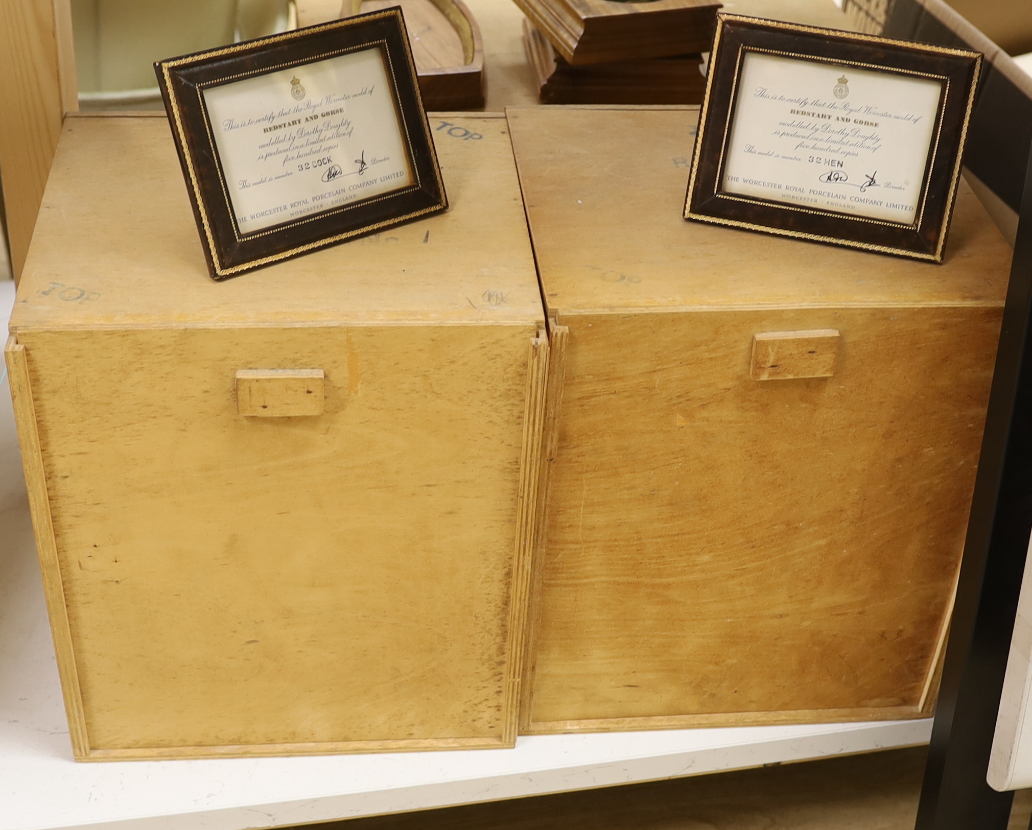 A Royal Worcester Redstart Hen and Cock and a Royal Worcester ‘Hibiscus’ with boxes and framed certificates (3)